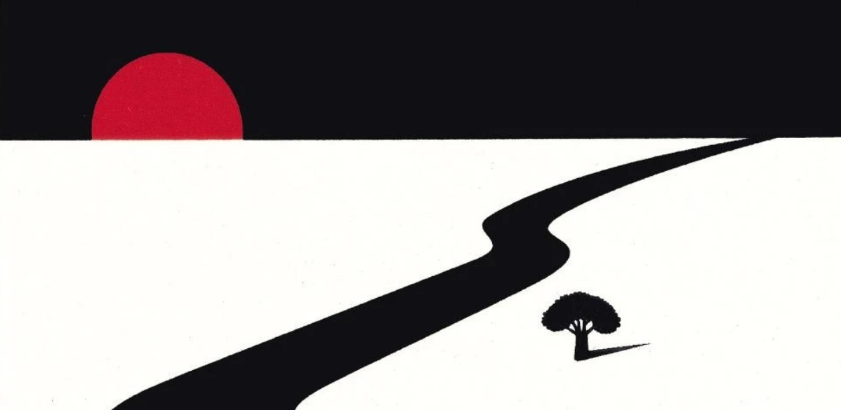 a winding black road like a trail of wet ink