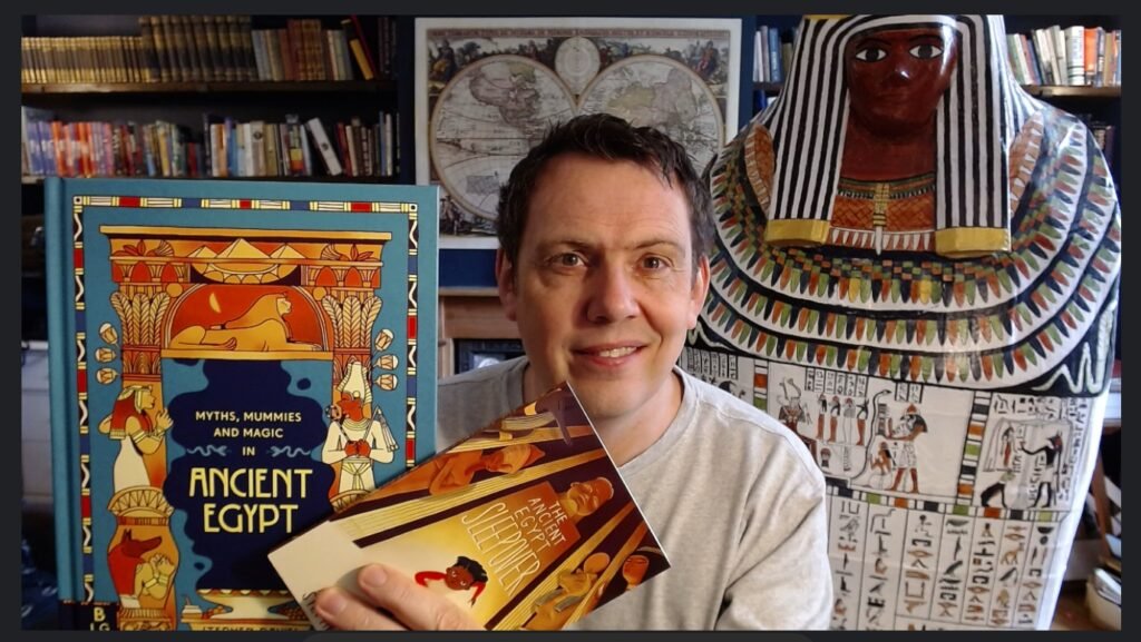 Stephen Davies showing his Ancient Egypt books during a virtual author visit