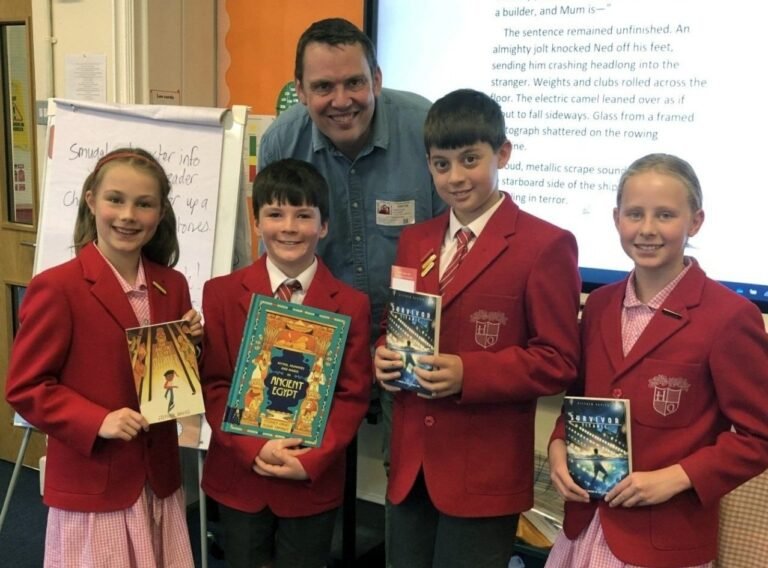 AIM High writing students with tutor Stephen Davies